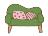 緑のソファとピンクのクッション