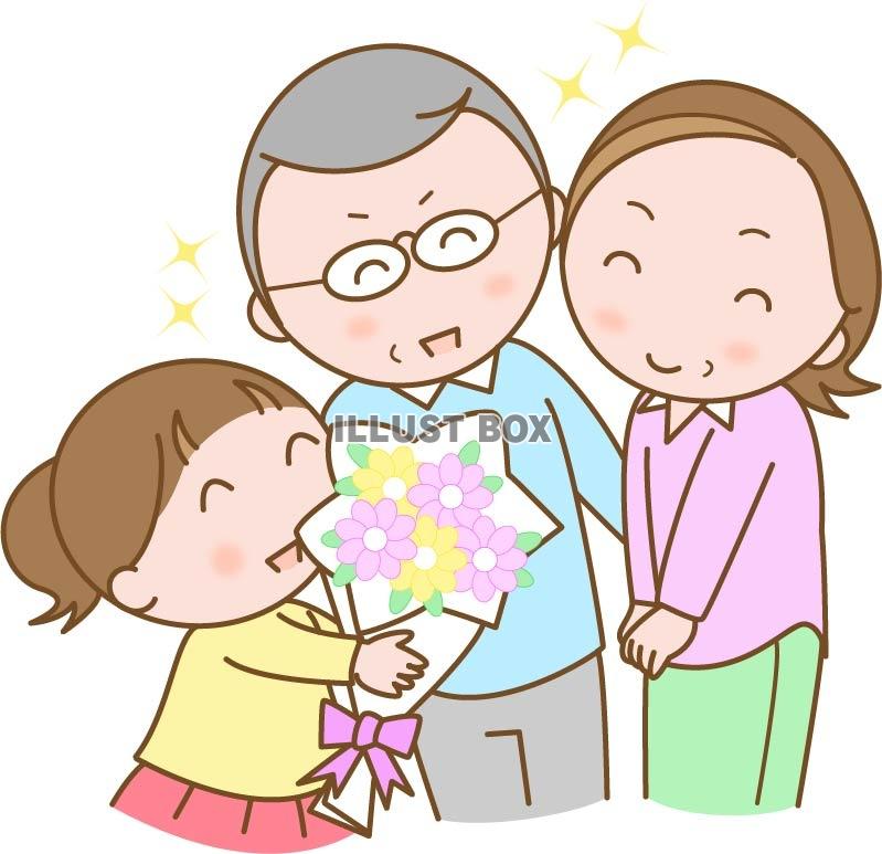 祖父母に花束を渡す孫