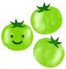 笑顔の緑色のトマト