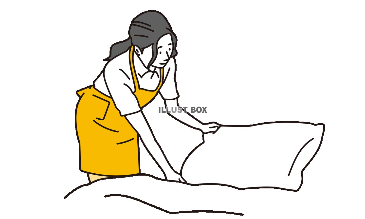 寝室でベッドメイキングをするアジア人女性