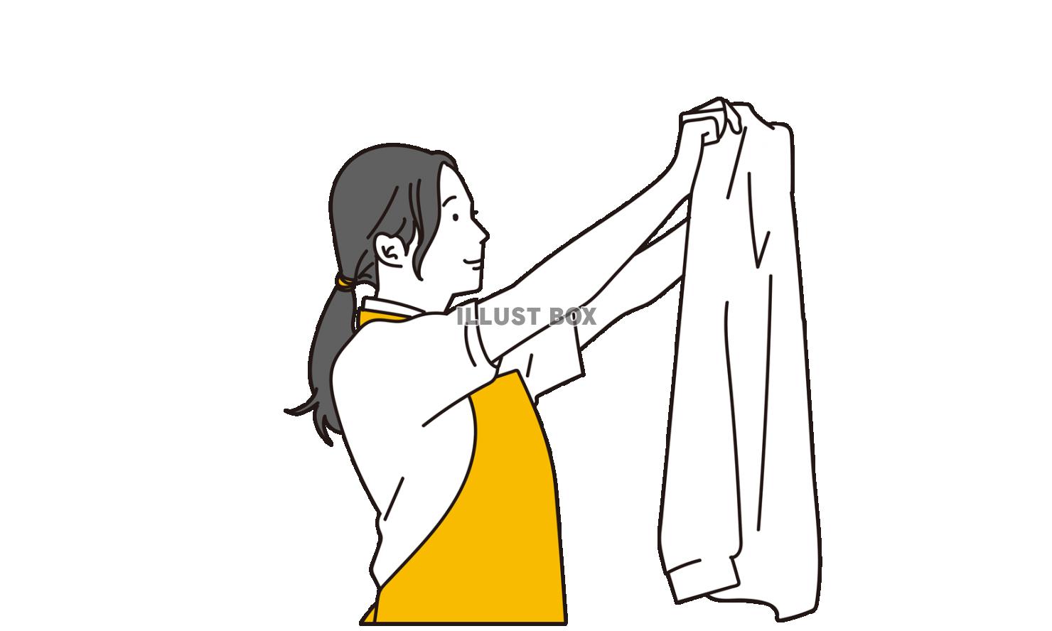 洗濯をする家事代行のアジア人の女性