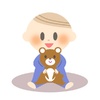 ぬいぐるみを抱っこする子供