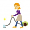 掃除機をかける女性
