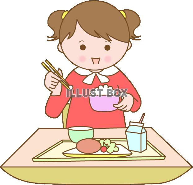 給食を食べている女の子