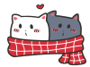 マフラーをする猫のカップル