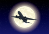 ナイトフライト　満月を背に飛行する旅客機