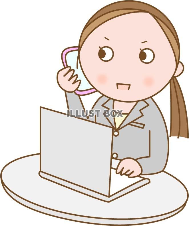 パソコンをしながら電話応対をする女性
