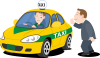 タクシーを拾うビジネスマン