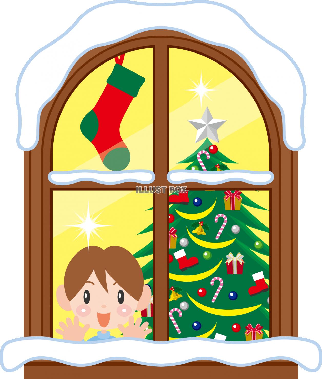 クリスマスに窓辺でサンタを待つ少年