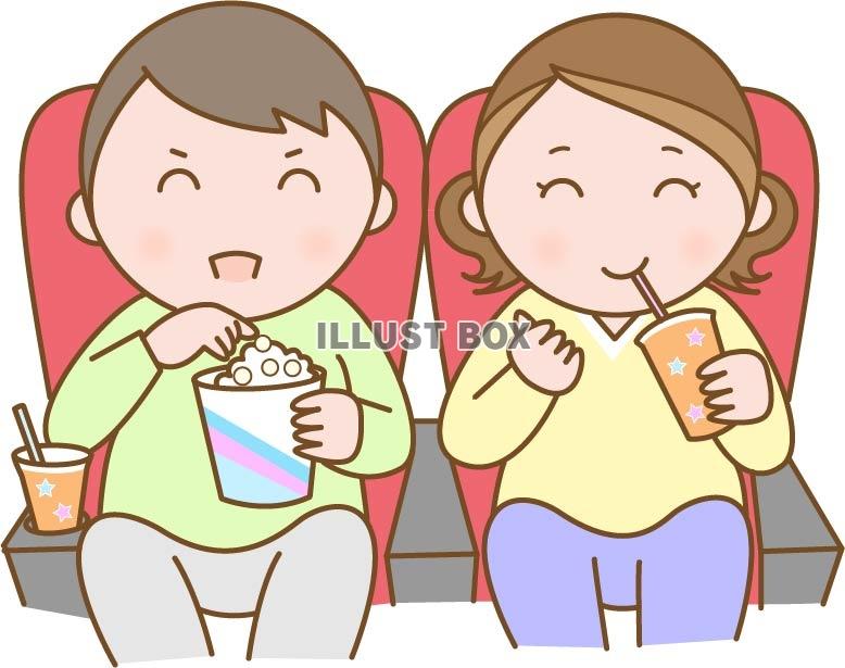 映画館で映画を観る男女