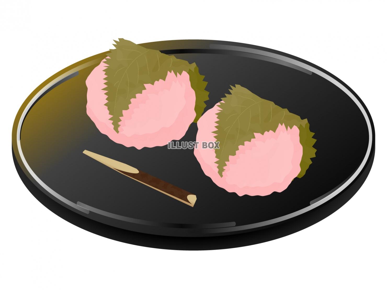 皿に乗せた2つの桜餅と黒文字