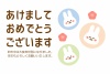 かわいい３羽のウサギの顔と花の2023年横向き年賀状