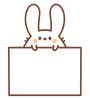 メッセージカードを持つウサギ