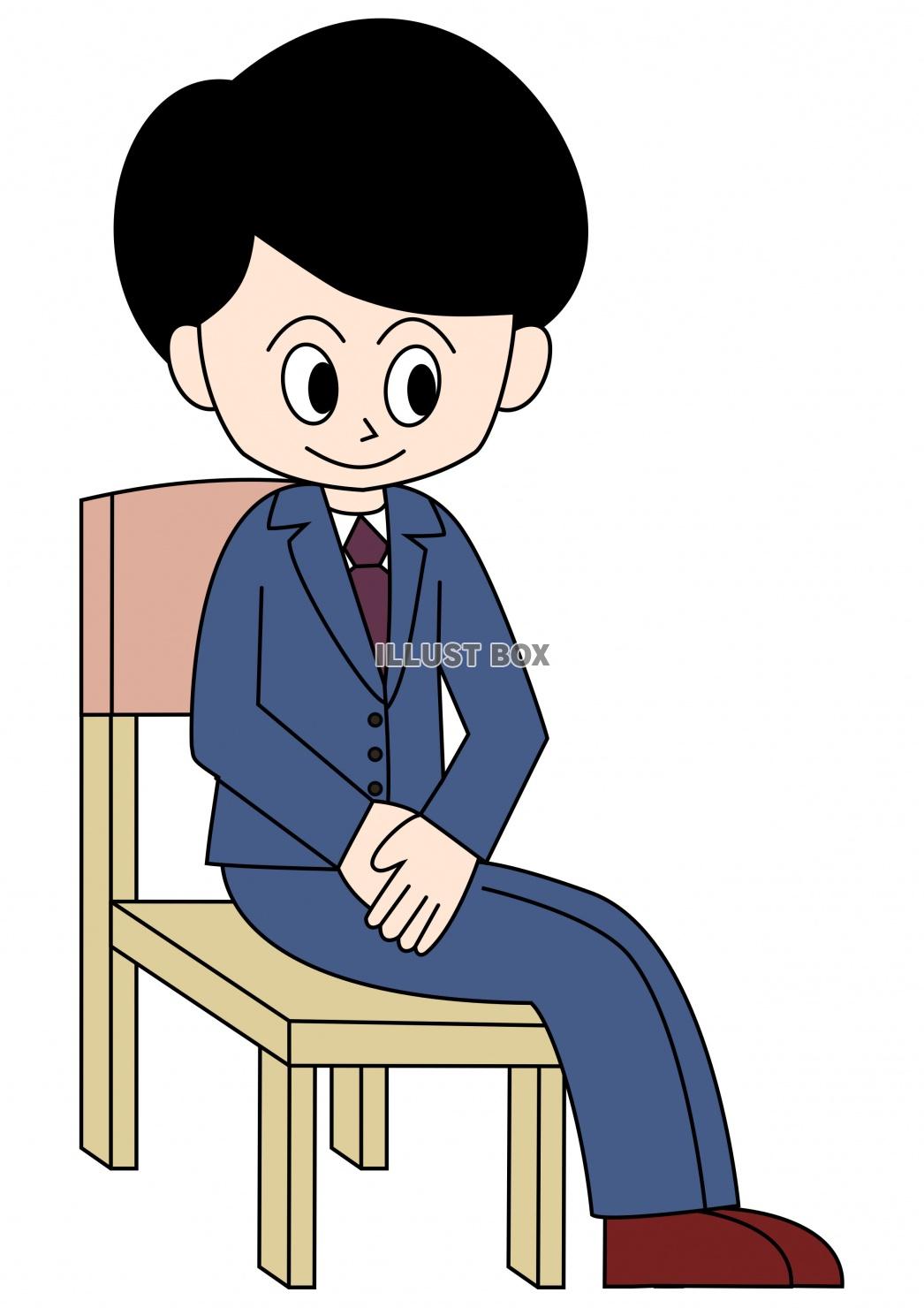 椅子に座る男性