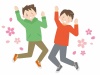 桜の中でジャンプする男の子達 