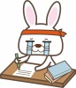 泣きながら勉強や仕事をするウサギのイラスト