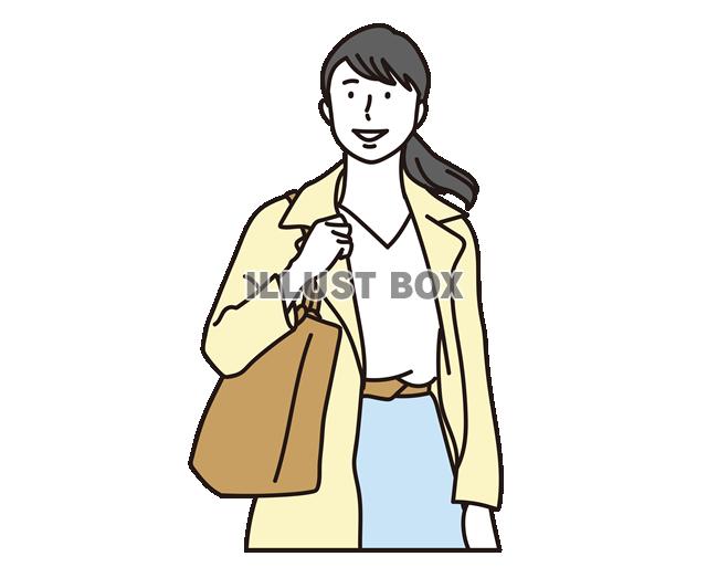コートを着て歩く女性
