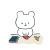 折り紙をするくま