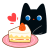 苺のショートケーキにときめく黒猫