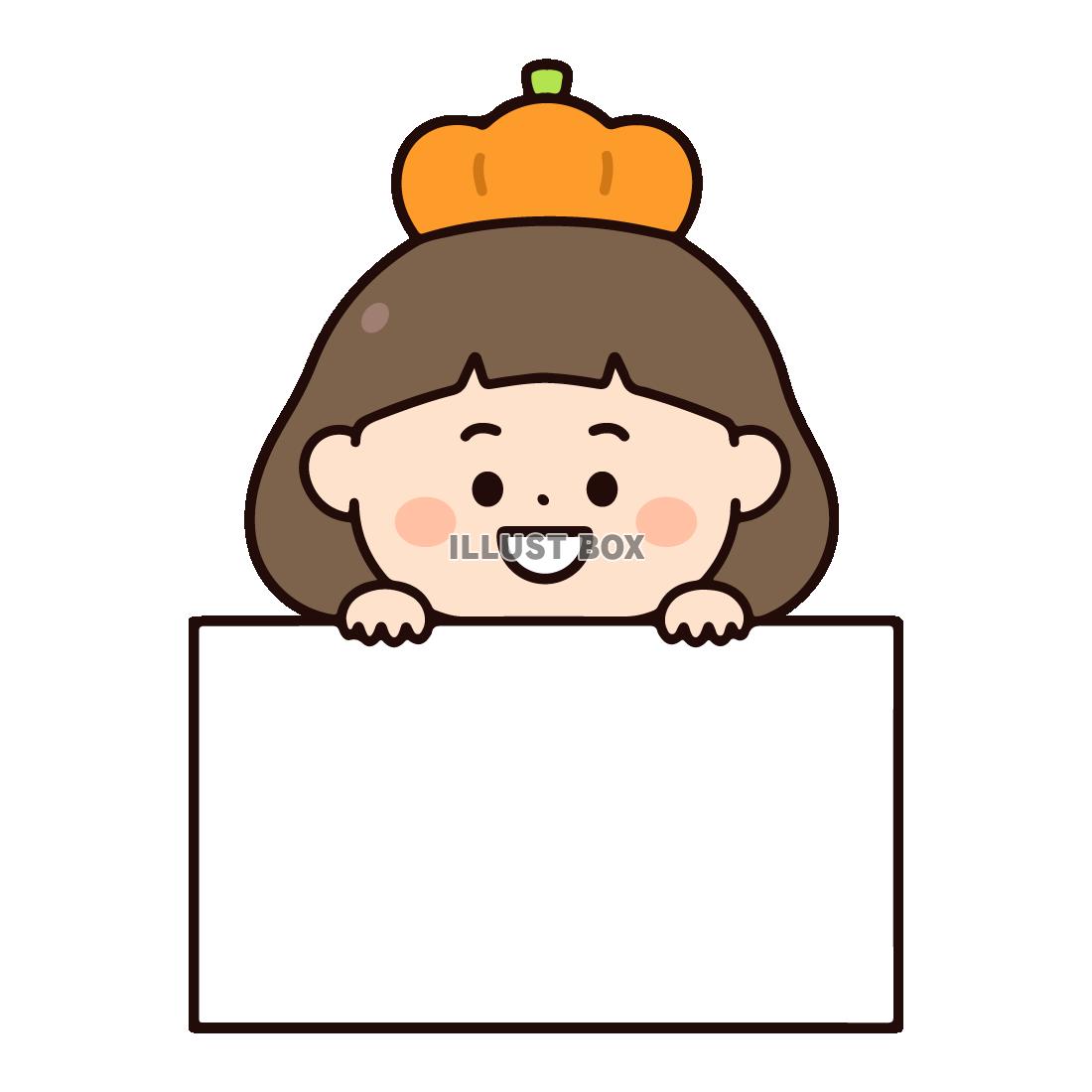 ホワイトボードをもつカボチャ帽子の女の子
