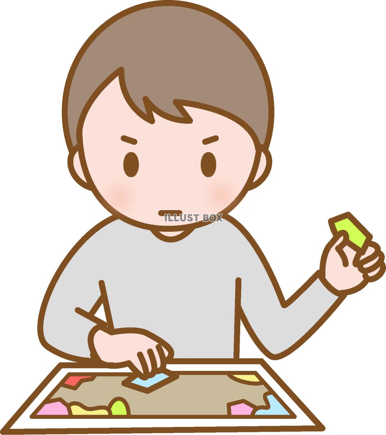 パズルで遊ぶ子ども