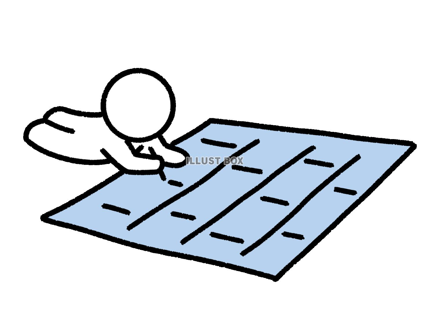大きな紙に書き込んでいる棒人間